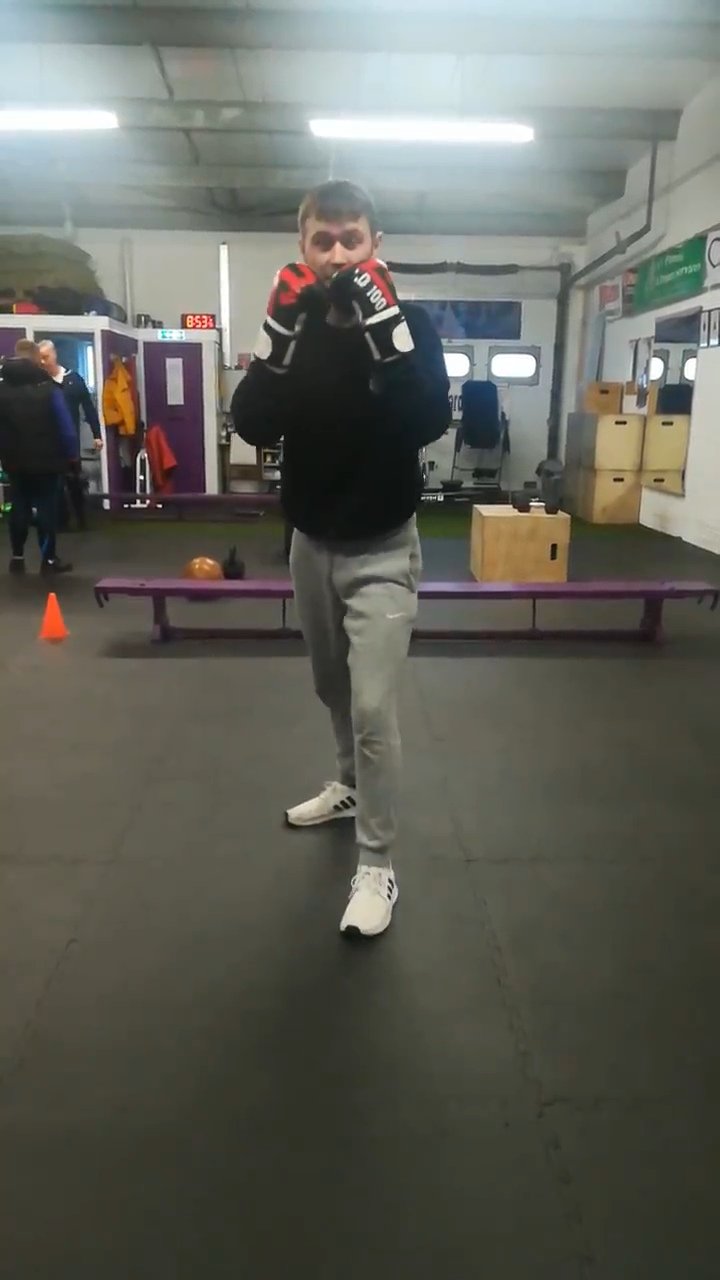 Boxing pad and bag work coaching session